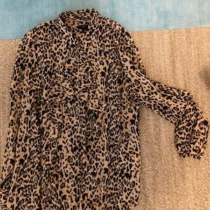 JCrew animal print blouse with ruffle.